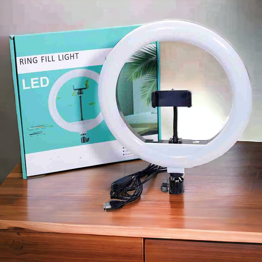 12" inch LED Ring Light With Phone Holder for Tiktok

YouTube Reels Photo-shoot Video Live Stream

Makeup Videos vlogging Vigo Video Shooting | 3 color modes Dimmable Lighting | Recording with Mobile Phone and Camera Clip Setup